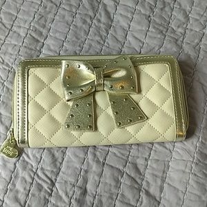 Betsey Johnson gold zipper wallet with bow
